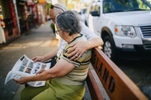 couple reading newspaper